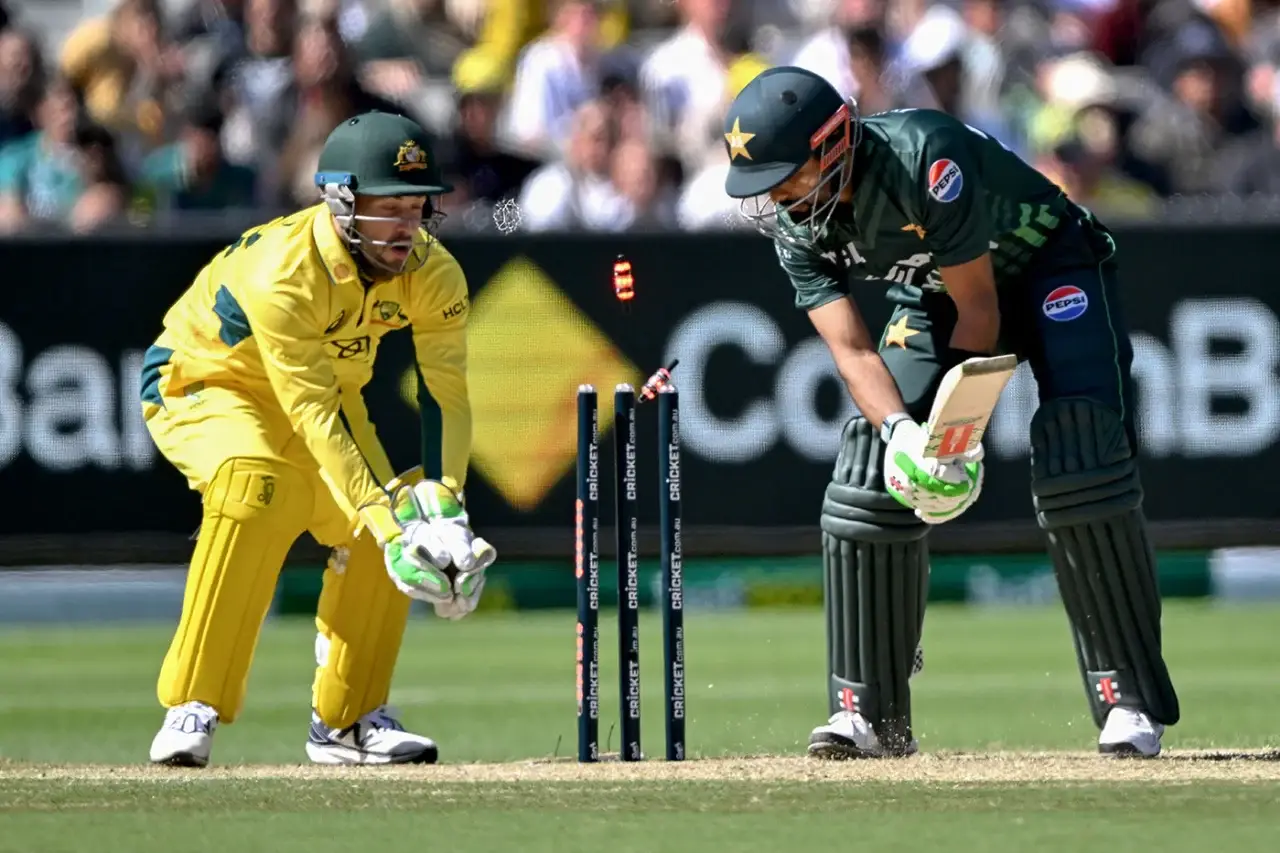 The cricketing world witnessed an intense clash between Pakistan and Australia in the 1st ODI of the series at the iconic Melbourne Cricket Ground (MCG) on November 4, 2024. In a game that was as thrilling as it was competitive, Australia managed to edge out Pakistan by 2 wickets, chasing down the target of 204 runs with 99 balls remaining. Let’s dive into the details of this nail-biting encounter. Pakistan’s Innings – Struggles and Highlights Score: 203 all out (44.6 overs) After winning the toss, Australia put Pakistan in to bat. Pakistan’s innings started with a tough challenge, as Australia’s fast bowlers were in exceptional form. Pakistan’s openers, Abdullah Shafique and Sami Ayub, struggled to establish a strong start. Shafique was dismissed for a brisk 20 off 16 balls, followed shortly by Ayub, who contributed 8 runs from 17 deliveries. The early dismissals left Pakistan at 22/2, under pressure right from the beginning. Key Players in the Middle Order: • Babar Azam showed resilience with his 37 off 64 balls, anchoring Pakistan’s innings despite the early setbacks. His innings was cut short by Adam Zampa, who bowled him, reducing Pakistan’s chances of a high total. • Mohammad Rizwan tried to stabilize the innings alongside Babar but was dismissed for 44 off 60 deliveries by Pat Cummins. Rizwan’s performance was notable as he took on the responsibility of guiding the innings after early losses. • Kamran Ghulam chipped in with a useful 26 off 32 balls, but his dismissal came at a crucial moment, adding pressure on the lower order. Pakistan’s lower-middle order, including Salman Agha and Irfan Khan, couldn’t provide the expected momentum, with both getting dismissed in the single digits. However, Shaheen Shah Afridi provided some late firepower with a quick 24 off 19 balls, hitting two sixes in his cameo before being bowled by Starc. Australia’s Bowling Performance: Australia’s bowlers maintained a tight grip throughout Pakistan’s innings, particularly Mitchell Starc, who claimed the title of Player of the Match with his figures of 3/33 in 10 overs. Starc’s deadly pace and accurate bowling consistently troubled Pakistan’s batsmen. Pat Cummins also contributed significantly, taking 3 wickets for 34 runs in his 9.4 overs, including the important wicket of Mohammad Rizwan. Adam Zampa proved his worth as a spinner with 2/46, dismantling Pakistan’s batting lineup alongside the pacers. Pakistan was bowled out for 203 in 44.6 overs, setting Australia a moderate target of 204 runs. Australia’s Chase – Pakistan’s Fierce Bowling vs. Australia’s Resilience Target: 204 runs in 50 overs Final Score: 204/8 in 33 overs Australia’s innings got off to a shaky start as Pakistan’s bowlers struck early. Shaheen Shah Afridi and Naseem Shah delivered intense opening spells, removing both openers, Matthew Short and Jake Fraser-McGurk, within the first 8 overs. Australia found themselves at 22/2, and the game seemed balanced at this stage. Middle Order Contributions: • Steven Smith stepped up for Australia with a steady 46 off 73 balls, but he couldn’t convert it into a match-winning knock. His dismissal by Shaheen Afridi brought Pakistan back into the game. • Josh Inglis added 49 runs off 44 balls, providing the necessary acceleration. He was ultimately dismissed by Irfan Khan, but his innings played a vital role in keeping Australia in the hunt. • Marnus Labuschagne made a brisk 39 from 22 balls, injecting momentum into the innings before being dismissed by Haris Rauf. As wickets fell regularly, Pakistan kept Australia under pressure, defending their low total admirably. At one point, Australia was 170/7, and Pakistan sensed an opportunity to pull off a remarkable victory. Lower Order Heroics: Australia’s captain Pat Cummins played a crucial role in steering the team towards victory with an unbeaten 32 off 31 balls. His composure under pressure allowed Australia to inch closer to the target. Despite Pakistan’s tight bowling and fielding, Cummins’ experience and resilience shone through, helping Australia cross the finish line with 2 wickets in hand. Pakistan’s Bowling Standout Performers: Pakistan’s bowlers displayed exceptional skill and tenacity, making Australia’s chase anything but easy: • Shaheen Shah Afridi was brilliant with figures of 3/42 in 10 overs, taking vital wickets and keeping Pakistan in the game. • Haris Rauf bowled aggressively, taking 2 wickets for 44 runs in his 9 overs. • Mohammad Hasnain also chipped in with a key wicket, while Naseem Shah’s economical spell kept the scoring in check. Despite their best efforts, Pakistan’s bowlers couldn’t completely break Australia’s lower order, and Australia eventually chased down the target in 33 overs. Match Summary • Result: Australia won by 2 wickets. • Player of the Match: Mitchell Starc (AUS) – 3 wickets for 33 runs • Top Scorers: • Pakistan: Mohammad Rizwan – 44 (60), Babar Azam – 37 (64) • Australia: Josh Inglis – 49 (44), Steven Smith – 46 (73) Key Takeaways 1. Australia’s Bowlers Lead the Charge: Mitchell Starc’s lethal pace and Pat Cummins’ disciplined bowling were instrumental in restricting Pakistan to a modest total. The Australian bowling attack showed why they are one of the best, with their bowlers adapting seamlessly to the pitch conditions. 2. Pakistan’s Fighting Spirit: Despite posting only 203 runs, Pakistan’s bowlers put up a valiant fight, striking regularly to keep Australia on edge. Shaheen Afridi and Haris Rauf’s combined efforts nearly pulled off an incredible defense. 3. Middle Order Strength: Australia’s middle order played a key role in stabilizing the innings after the early setbacks. The contributions from Steven Smith and Josh Inglis were essential to their chase, providing the backbone that allowed Cummins to finish the job. 4. Resilient Leadership by Pat Cummins: Cummins not only contributed with the ball but also held his nerve in the chase, demonstrating his all-round abilities and leadership. His calm and collected approach under pressure ultimately guided Australia to victory. Conclusion The 1st ODI between Pakistan and Australia at Melbourne was a closely contested affair, showcasing the strengths of both teams. Australia’s victory by 2 wickets sets an exciting tone for the series, as Pakistan’s bowlers proved they can challenge one of the world’s best batting lineups, even with a low total. This thrilling encounter has raised anticipation for the upcoming matches, promising more competitive cricket.